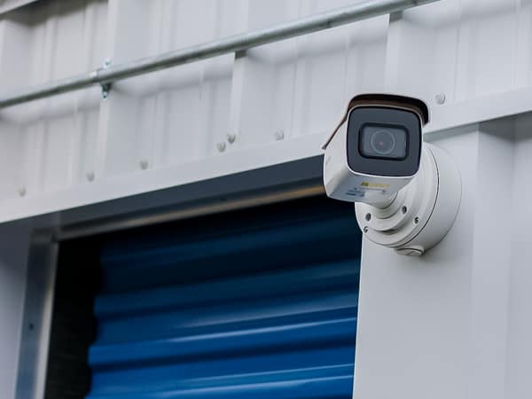 Security camera mounted on a storage building