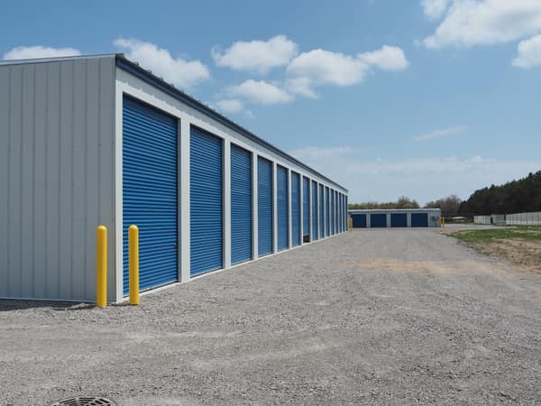 Row of tall 12x55 RV and boat storage units with 14-foot doors